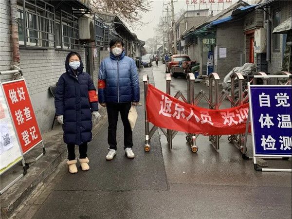 民建市委机关干部下沉社区一线参与疫情防控