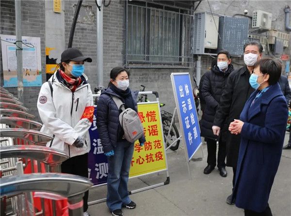 民建市委机关干部下沉社区一线参与疫情防控