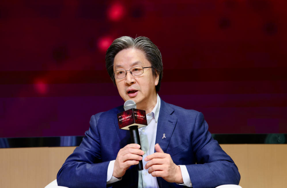 江泽飞：把“粉红丝带”挂胸上 把患者放心里