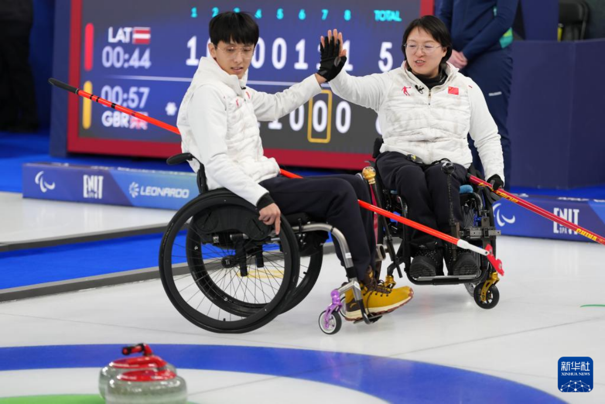 冬残奥会——轮椅冰壶混双循环赛:中国队胜意大利队 冬残奥会——轮椅冰壶混双循环赛:中国队胜意大利队